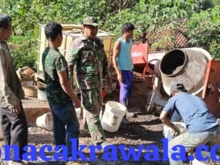 Tak Kenal Hari Libur, Satgas TMMD dan Warga Kebut Pengecoran Jalan Penghubung Dua Kecamatan
